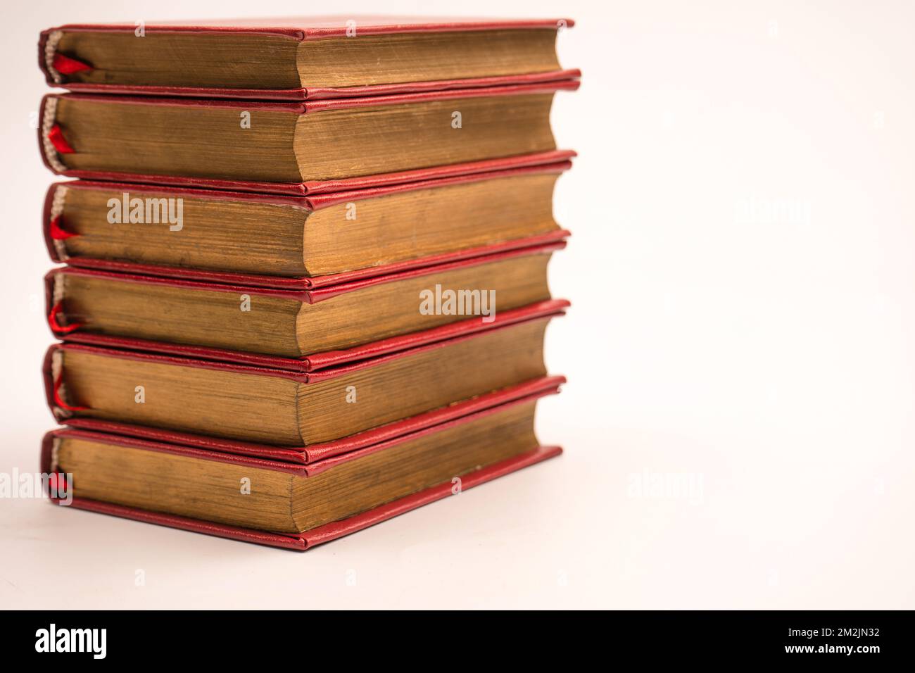 Old books isolated on a white background Stock Photo - Alamy