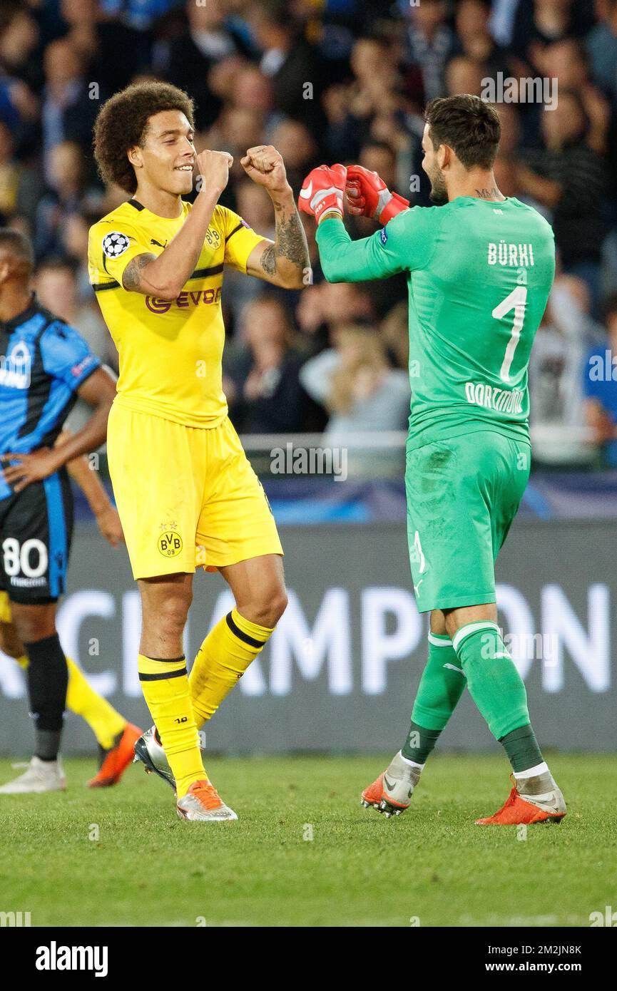 Dortmund's Axel Witsel and Dortmund's goalkeeper Roman Burki celebrate after winning a game between Belgian soccer team Club Brugge KV and German club Borussia Dortmund, in Brugge, Tuesday 18 September 2018, day one of the UEFA Champions League, in group A. BELGA PHOTO KURT DESPLENTER Stock Photo