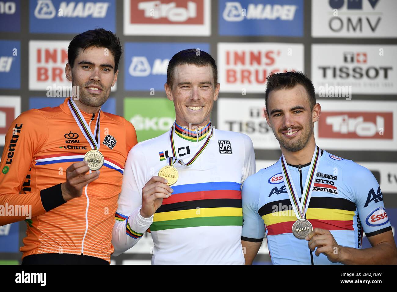 Dutch silver medalist Tom Dumoulin of Team Sunweb, Australian gold medalist Rohan Dennis and Belgian bronze medalist Victor Campenaerts celebrate on the podium of the men's elite individual time trial race at the 2018 UCI Road World Championships Cycling in Innsbruck, Tirol, Austria, Wednesday 26 September 2018. This year's Worlds are taking place from 22 to 30 September. BELGA PHOTO ERIC LALMAND  Stock Photo