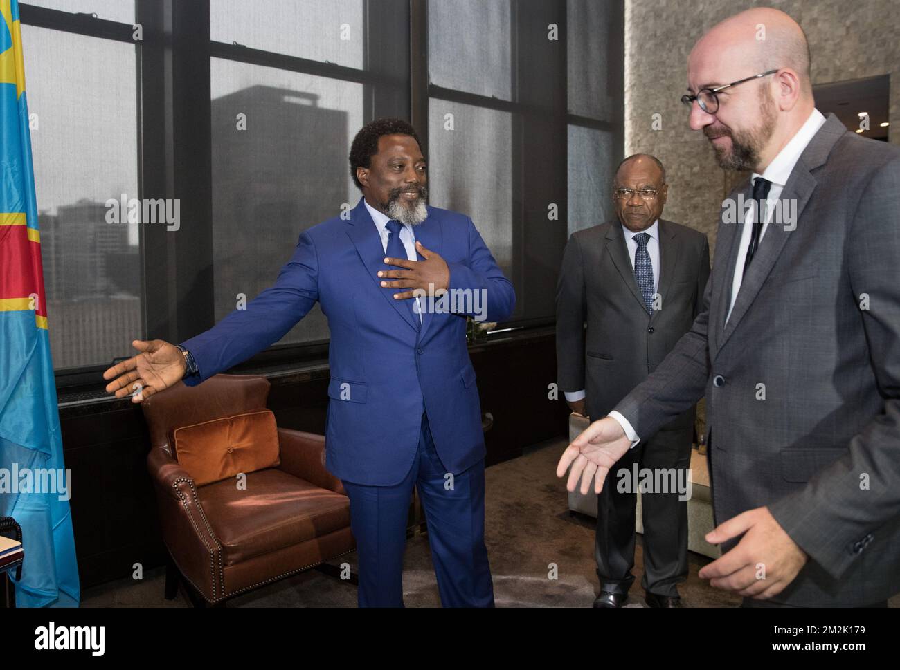 DR Congo President Joseph Kabila (L) and Foreign Minister Leonard She Okitundu welcome Belgian Prime Minister Charles Michel prior a meeting during the 73th session of the United Nations General Assembly (UNGA 73), in New York City, United States of America, Friday 28 September 2018. BELGA PHOTO BENOIT DOPPAGNE Stock Photo