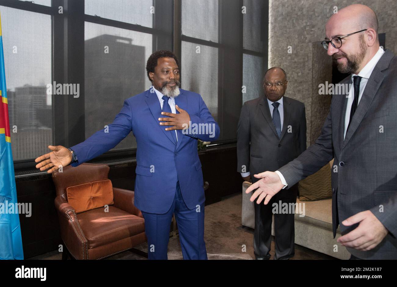 DR Congo President Joseph Kabila (L) and RD Congo Foreign Minister Leonard She Okitundu (C) welcome Belgian Prime Minister Charles Michel prior a meeting during the 73th session of the United Nations General Assembly (UNGA 73), in New York City, United States of America, Friday 28 September 2018. BELGA PHOTO BENOIT DOPPAGNE Stock Photo