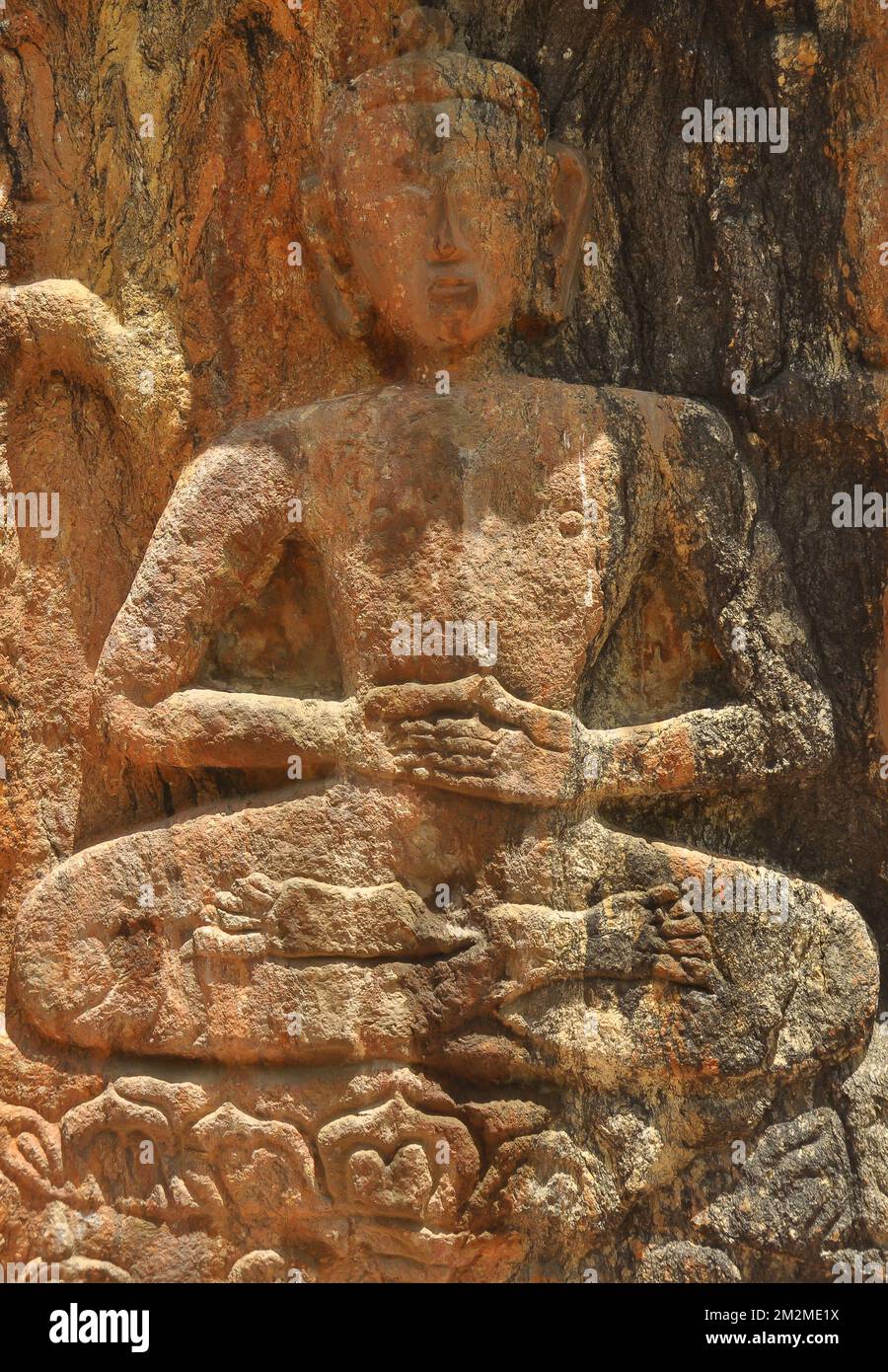 Photo of one Buddha rock statue in Gyalwa Ringna which is located in