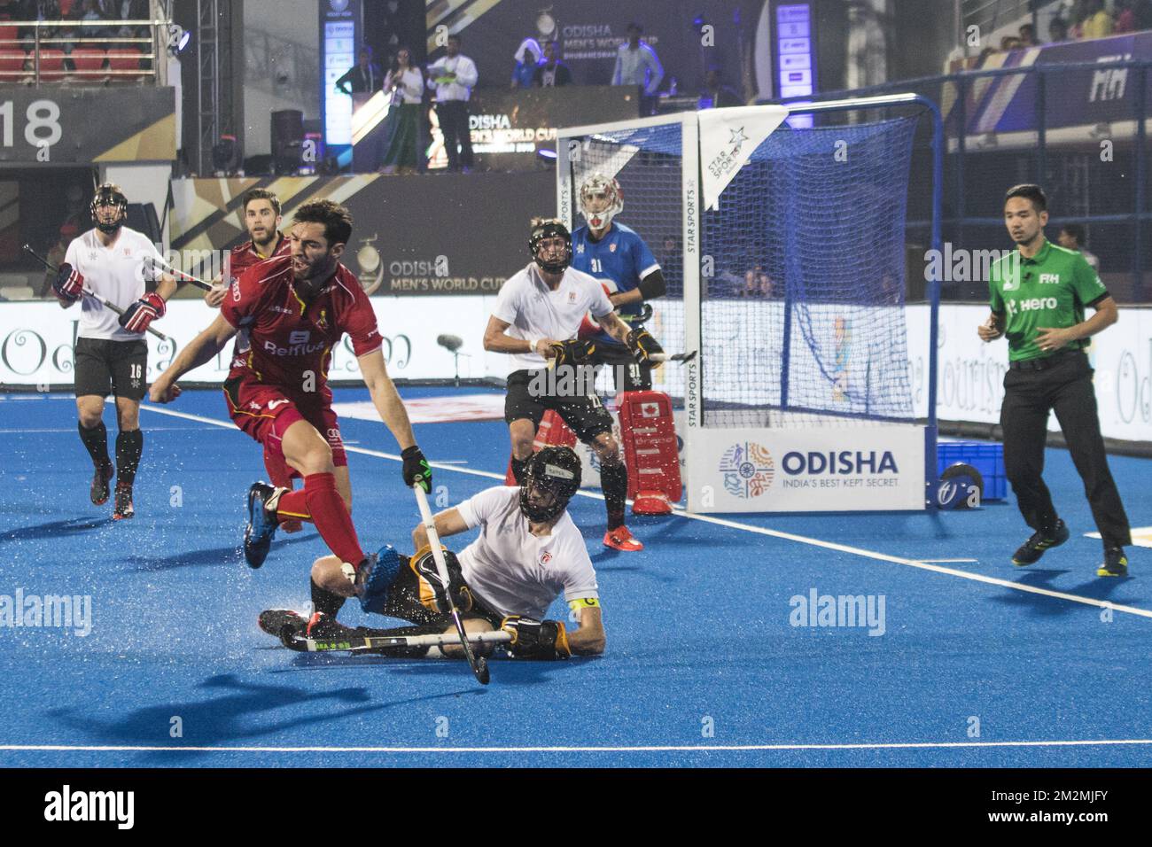 Belgium's Loick Luypaert (L) and Canada's captain Scott Tupper (R