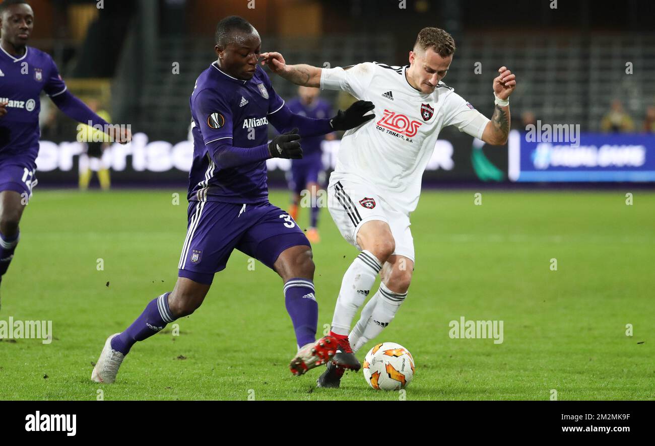 Anderlecht's Edo Kayembe and Spartak's midfielder Erik Grendel fight for the ball during the match between Belgian soccer team RSC Anderlecht and Slovakian club Spartak Trnava, Thursday 29 November 2018 in Anderlecht on the fifth day of the UEFA Europa League group stage, in group D. BELGA PHOTO VIRGINIE LEFOUR Stock Photo