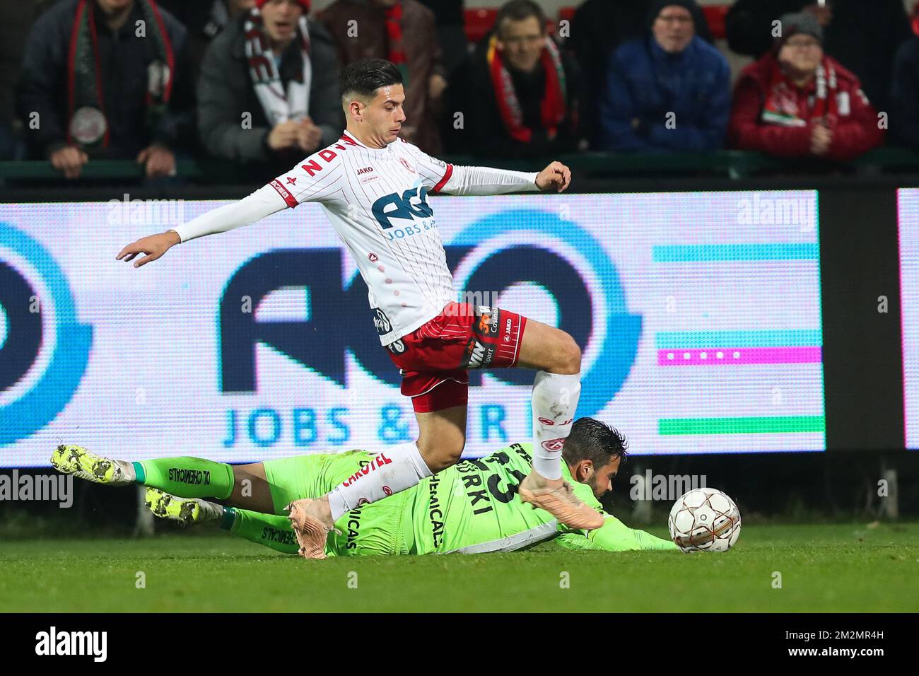 Kortrik's Larry Azouni and Essevee's Marco Burki fight for the ball during a soccer game between KV Kortrijk and Zulte Waregem, Tuesday 04 December 2018 in Kortrijk, in the 1/8th final of the 'Croky Cup' Belgian cup. BELGA PHOTO BRUNO FAHY Stock Photo