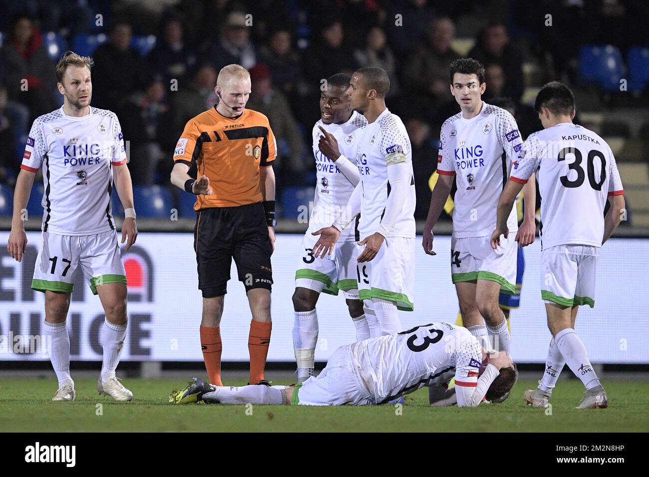 OHL's Julien Gorius, referee Jordy Vermeire, OHL's Katuku Tshimanga and