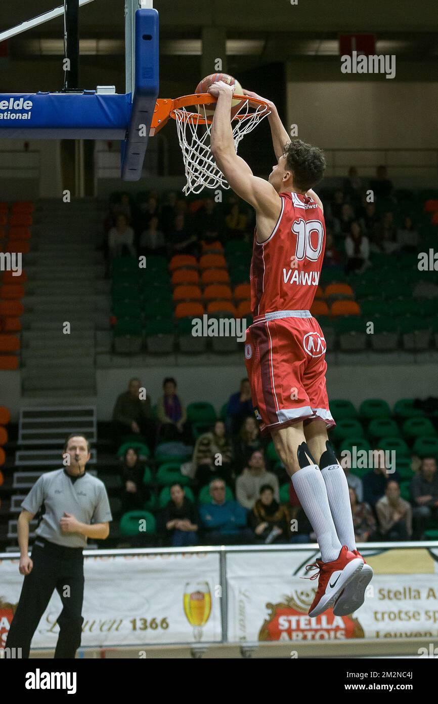Antwerp's Hans Vanwijn scores a dunk during the basketball match