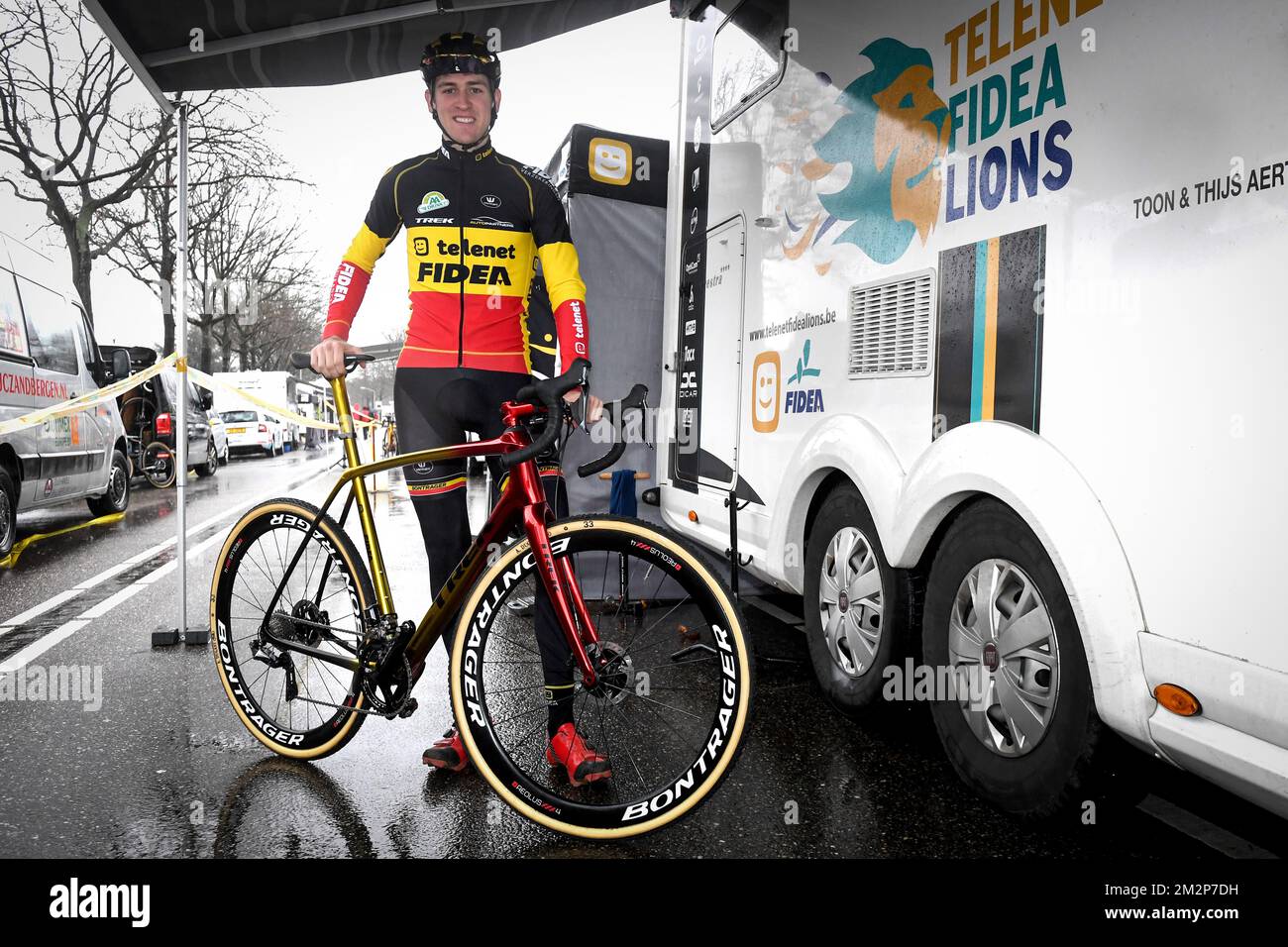 Belgian Toon Aerts shows his new bike before the men elite race of the World Cup cyclocross in Hoogerheide the Netherlands 9th and last stage of the UCI World Cup competition Sunday