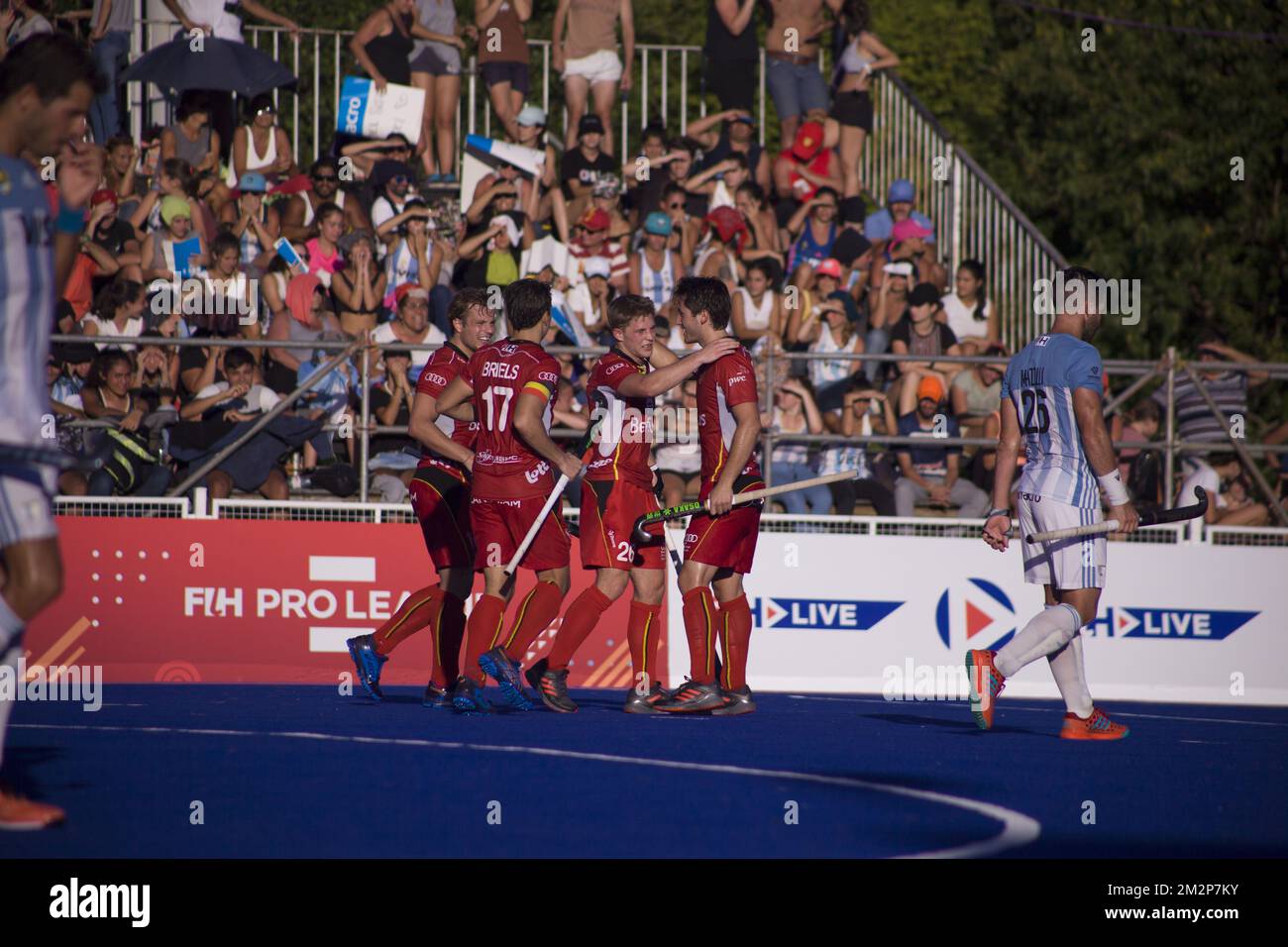 Belgian players celebrate after scoring at a Pro League hockey game