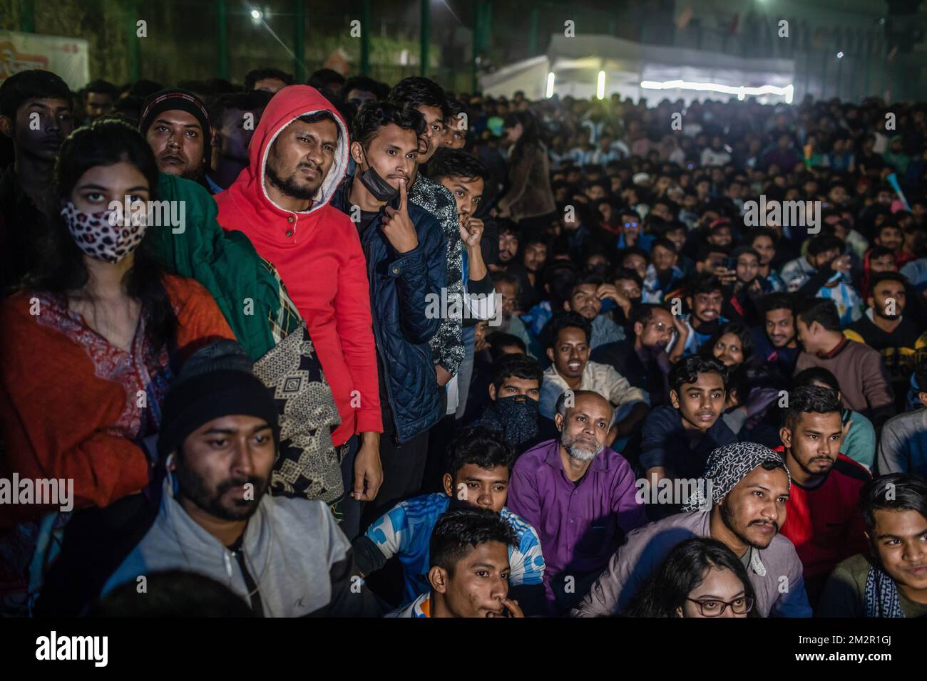Dhaka, Bangladesh. 14th Dec, 2022. Argentine soccer fans watch the live stream of their team's match against Croatia at the World Cup, hosted by Qatar. The Argentinian team, led by Messi, beat Croatia 3-0, qualifying for the finals, for the first time since 2014. (Photo by Sazzad Hossain/SOPA Images/Sipa USA) Credit: Sipa USA/Alamy Live News Stock Photo