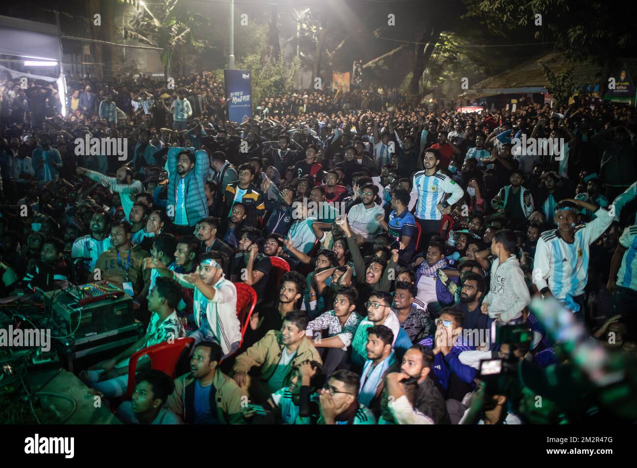 Dhaka, Bangladesh. 14th Dec, 2022. Argentine soccer fans watch the live stream of their team's match against Croatia at the World Cup, hosted by Qatar. The Argentinian team, led by Messi, beat Croatia 3-0, qualifying for the finals, for the first time since 2014. Credit: SOPA Images Limited/Alamy Live News Stock Photo