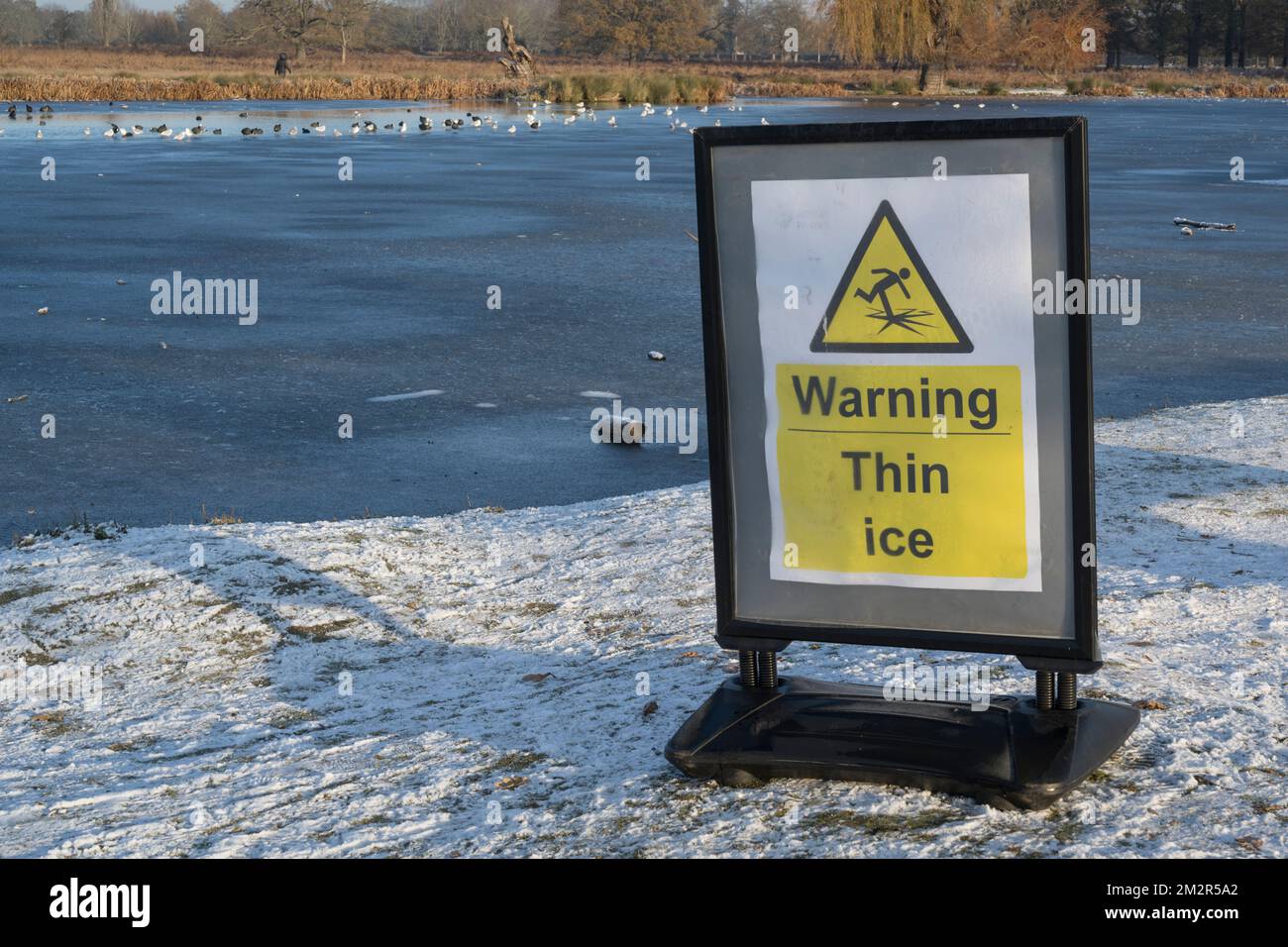 Danger thin ice warning Stock Photo