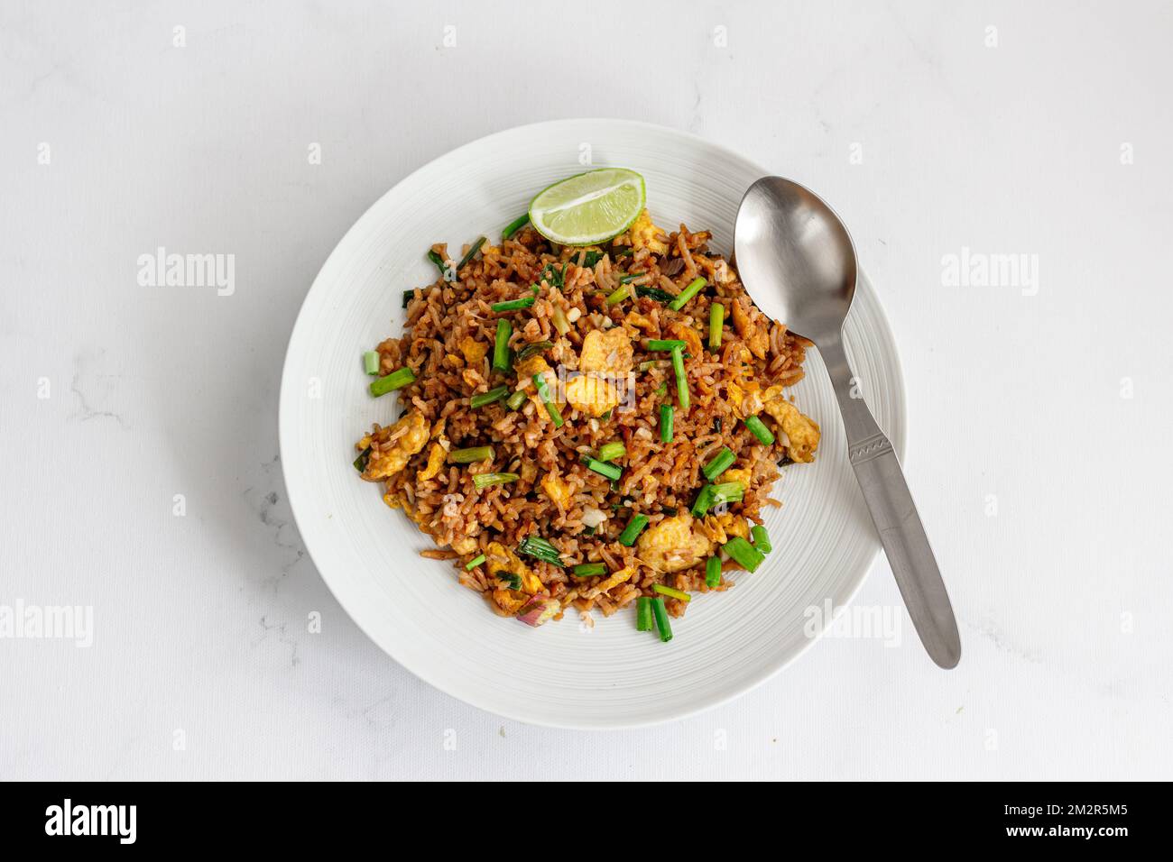 Chinese Egg Fried Rice with Lemon, Asian Food Photography Top Down Food Photo Stock Photo