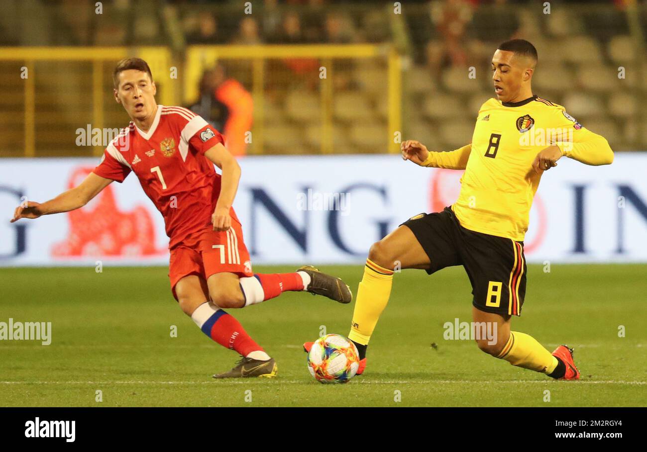 Russian Daler Kuzyayev and Youri Tielemans fight for the ball during a match between Belgian national soccer team Red Devils and Russia, in Brussels, Thursday 21 March 2019, the first of a series of 10 European Cup 2020 qualification games. BELGA PHOTO VIRGINIE LEFOUR Stock Photo