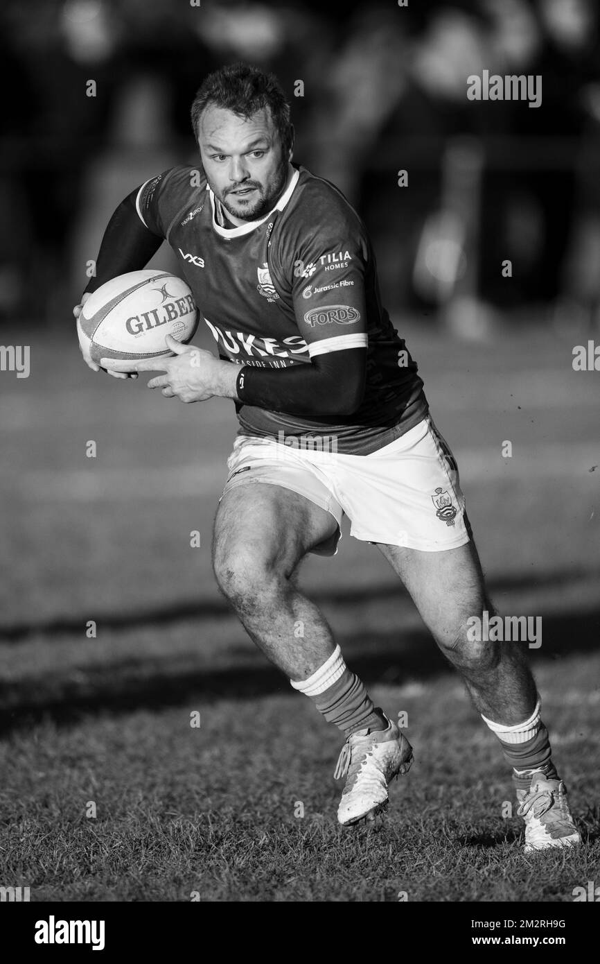 Rugby player in action Stock Photo