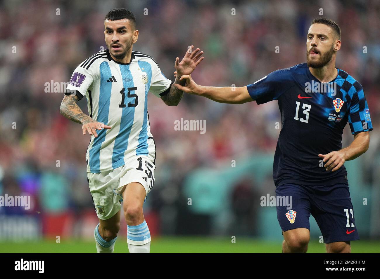 Angel Correa of Argentina and Nikola Vlasic of Croatia during the FIFA ...