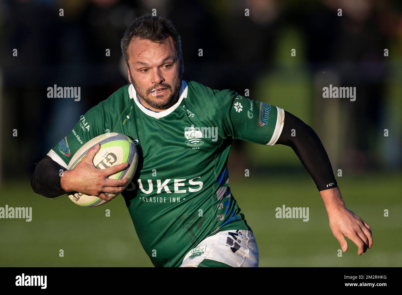 Rugby player in action Stock Photo