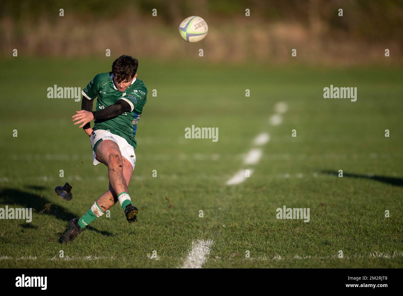 Rugby player converting kick Stock Photo
