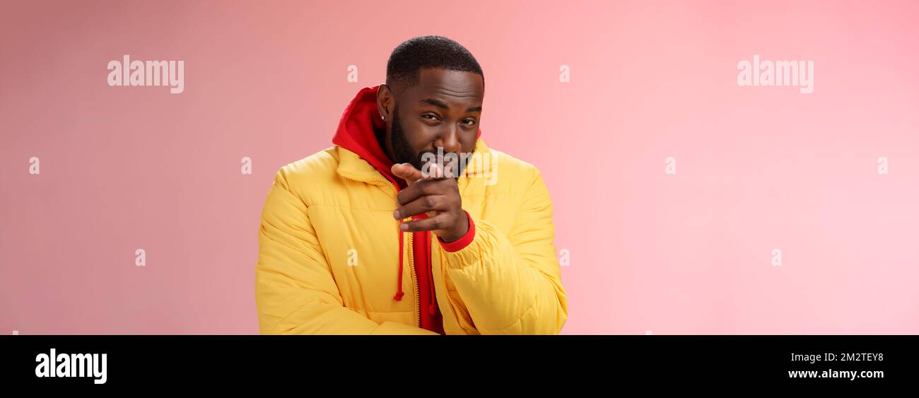 Guy suspecting you pointing camera index finger squinting disbelief unsure, standing pink background asking question look doubtful hesitant, express Stock Photo