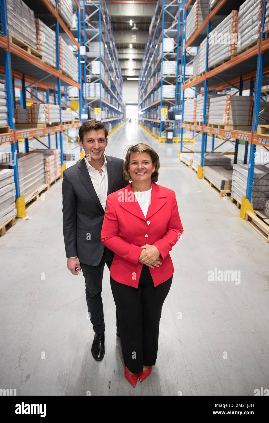 Van Marcke CEO Caroline Van Marcke poses with her son Aldric d'Oultremont,  EDC (Excellent Distribution to Customers) Project Manager during the  opening of a new distribution center of sanitary goods producer Van