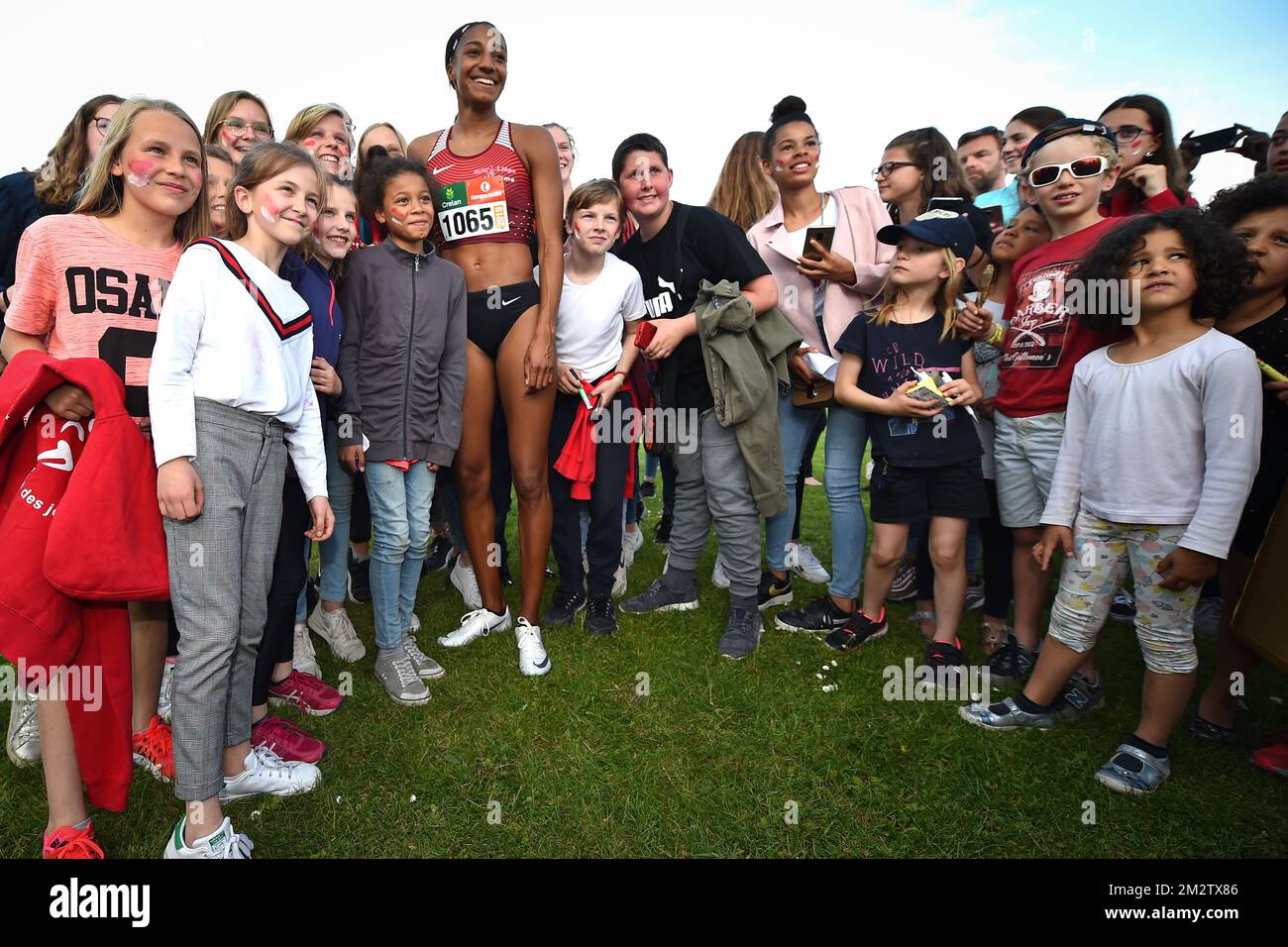 Belgian athlete Nafissatou 'Nafi' Thiam (C) meets young fans after the ...
