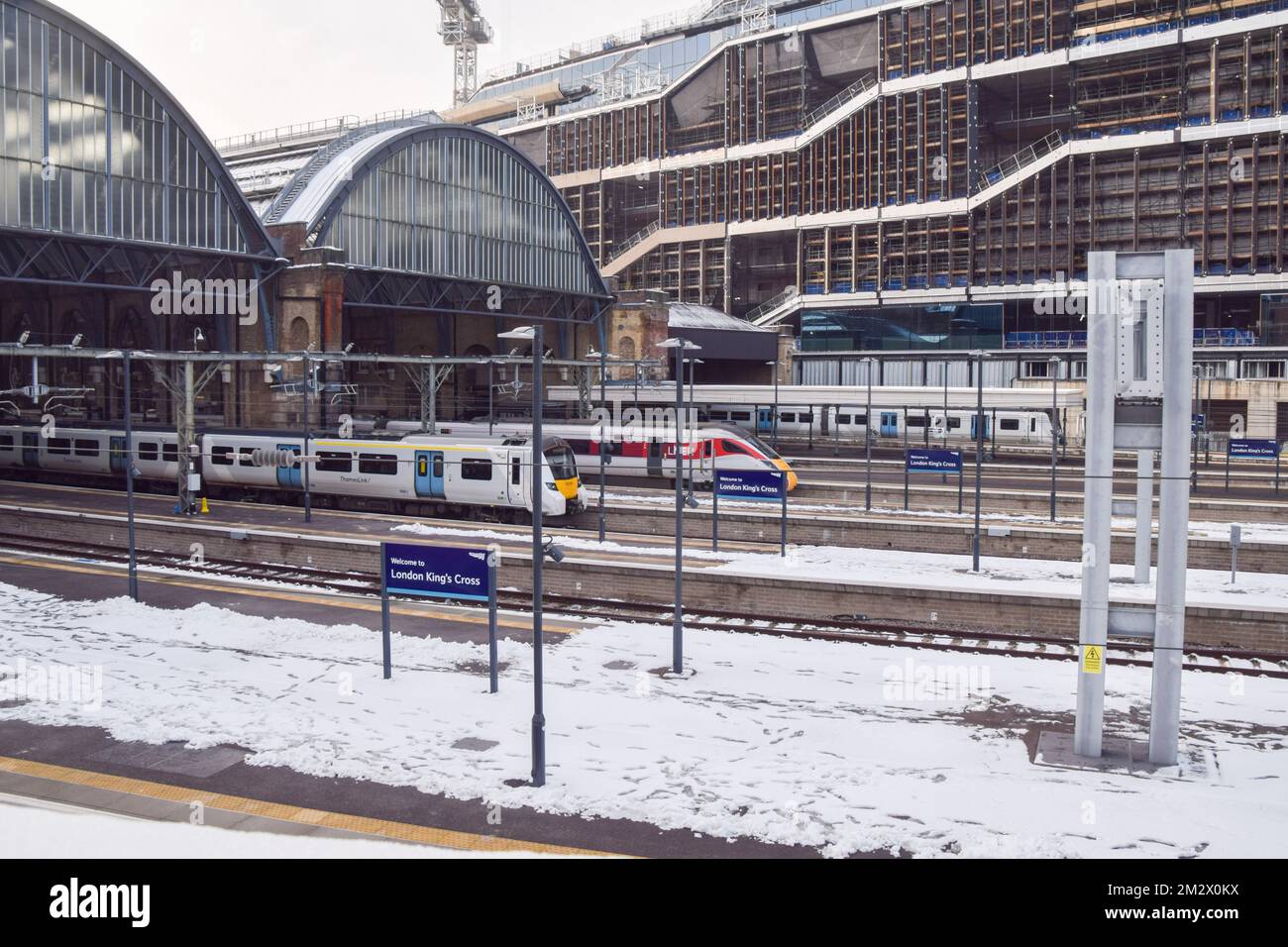 London, UK. 14th December 2022. Trains await at King's Cross Station platforms covered in snow and ice as the rail strikes continue across the UK amid freezing temperatures. Credit: Vuk Valcic/Alamy Live News Stock Photo