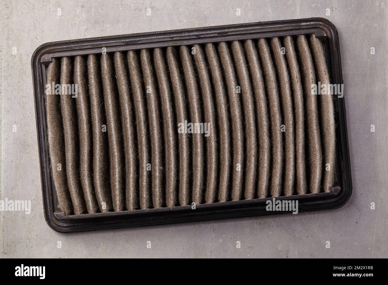 used air filter that must be replaced in the context of car maintenance Stock Photo Alamy