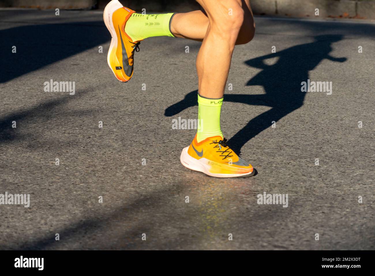 Running Shoes with Shadow Stock Photo