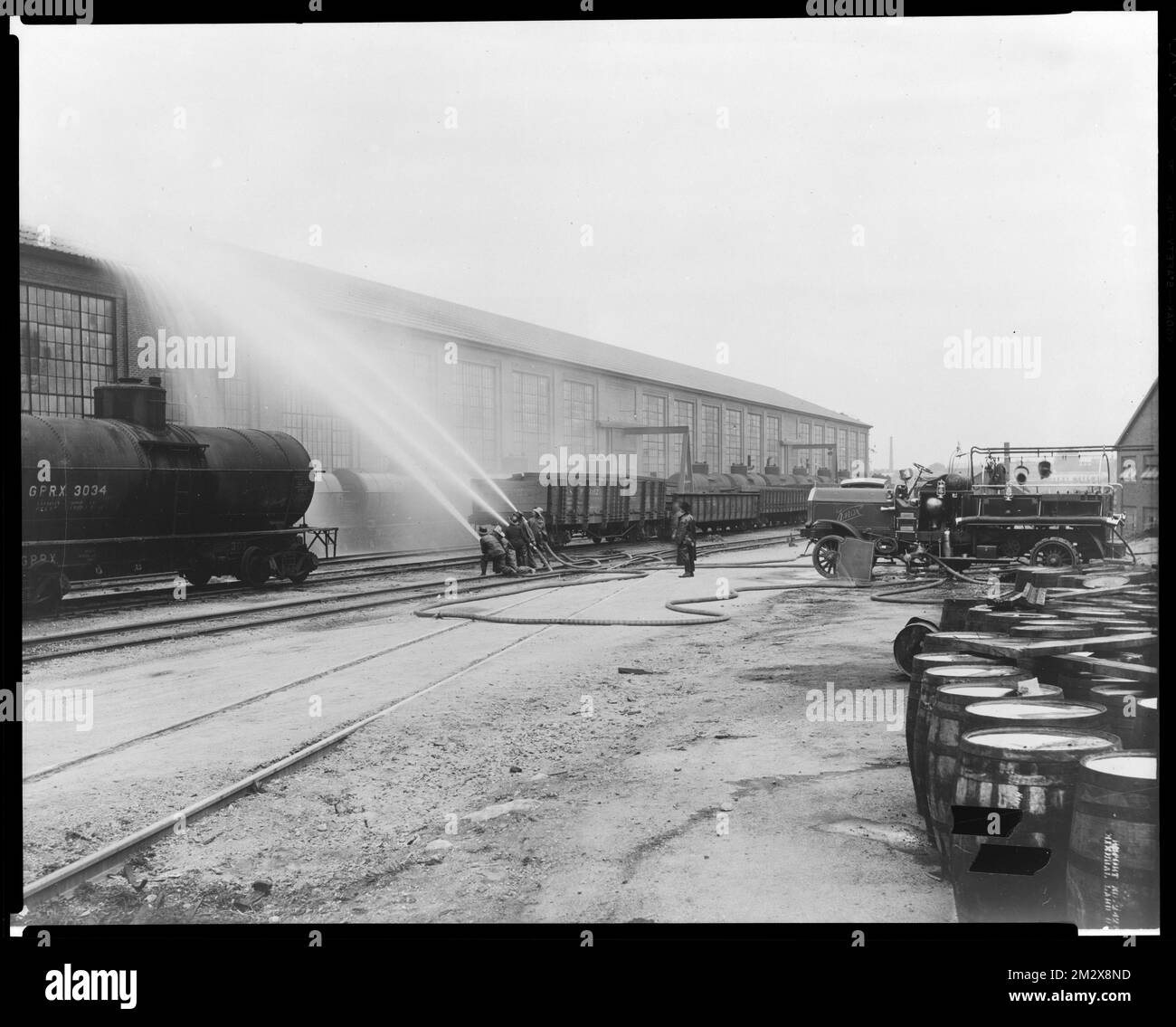 Fire department test, 1919 , Armories, Fire engines, Fire fighters