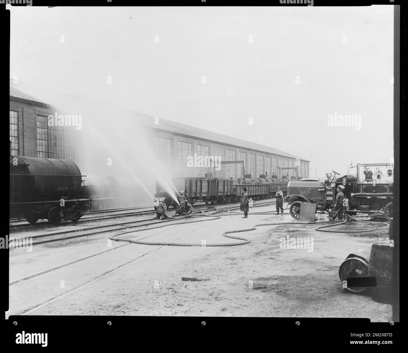 Fire dept. test, 1919 , Armories, Fire engines, Fire fighters, Fire