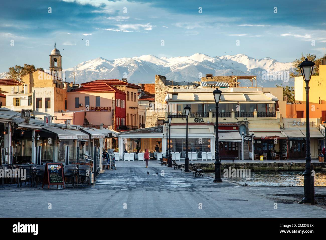Early morning along the harbor in Chania as the city begins to wake.  Crete, Greece. Stock Photo