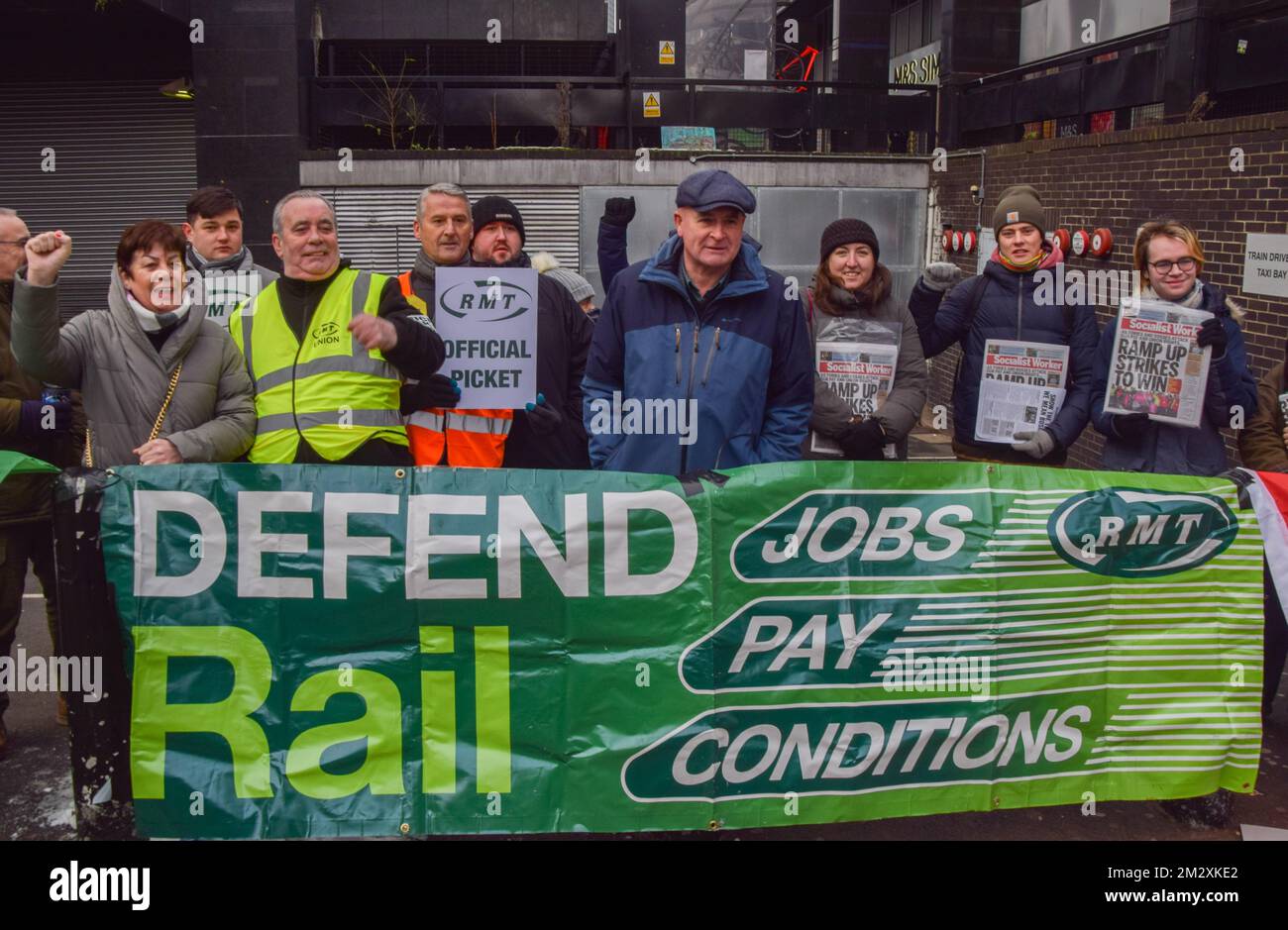 London, UK. 13th December 2022. RMT General Secretary Mick Lynch joins the picket line outside