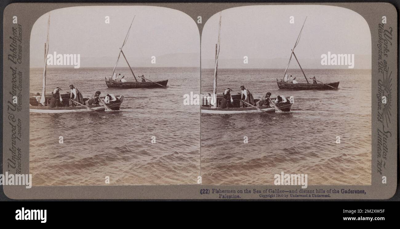 Fishermen on the Sea of Galilee and distant hills of the Gaderenes, Palestine (St. Luke v I-7) , Fishing boats, Fishermen, Fishing nets, Lakes & ponds Edgar Sutton Dorr Photograph Collection Stock Photo