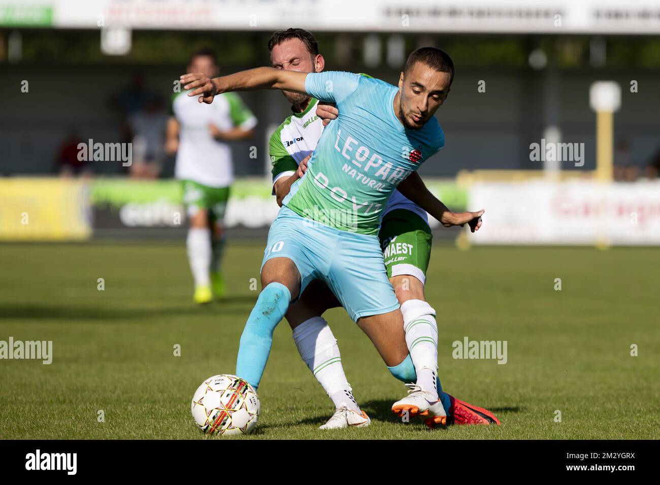 Dessel's Kevin Janssens and Virton's Mehdi Lazaar fight for the ball during a soccer game between Dessel Sport (First amateur division) and Royal Excelsior Virton (1b 2nd division), Saturday 24 August 2019 in Dessel, in the fifth round of the 'Croky Cup' Belgian cup. BELGA PHOTO KRISTOF VAN ACCOM Stock Photo