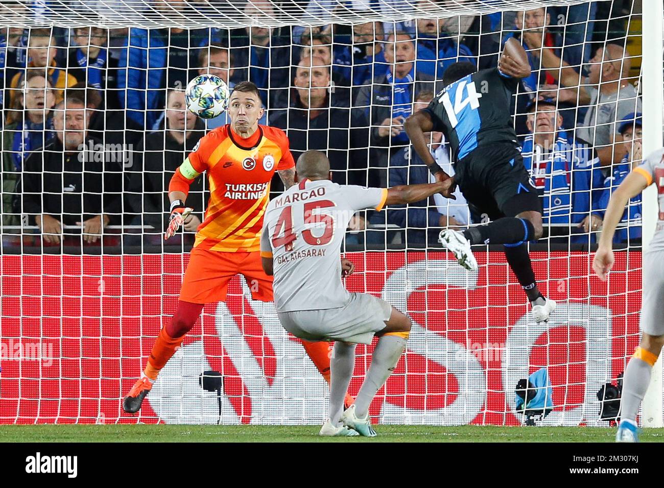 Galatasaray's Fernando Muslera, Galatasaray's Marcos do Nascimento Teixeira and Club's David Okereke fight for the ball during a game between Belgian soccer team Club Brugge and Turkish club Galatasaray AS, in Brugge, Wednesday 18 September 2019, on the first day of the group stage of the UEFA Champions League, in the group A. BELGA PHOTO BRUNO FAHY Stock Photo