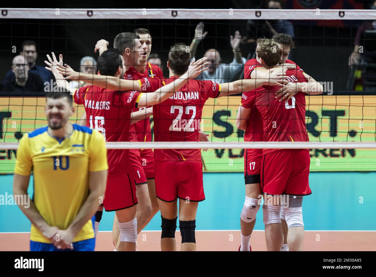 Belgium's players celebrate during a volleyball game between Belgian