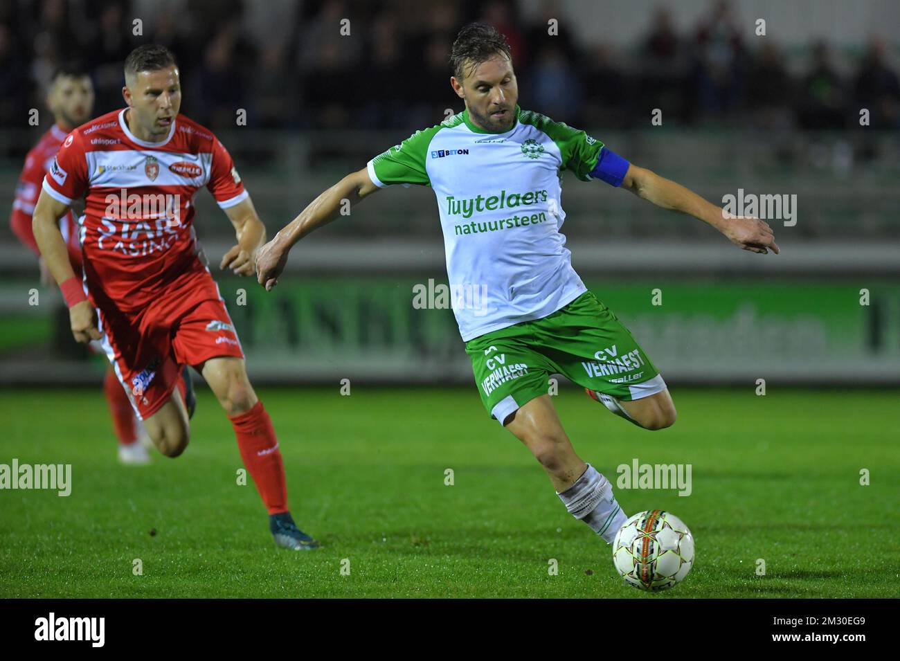 Dessel's Kevin Janssens and Mouscron's Nemanja Antonov fight for the ball during a soccer game between Dessel Sport (1Am) and Royal Excel Mouscron, Wednesday 25 September 2019 in Dessel, in the 1/16th final of the 'Croky Cup' Belgian cup. BELGA PHOTO LUC CLAESSEN Stock Photo