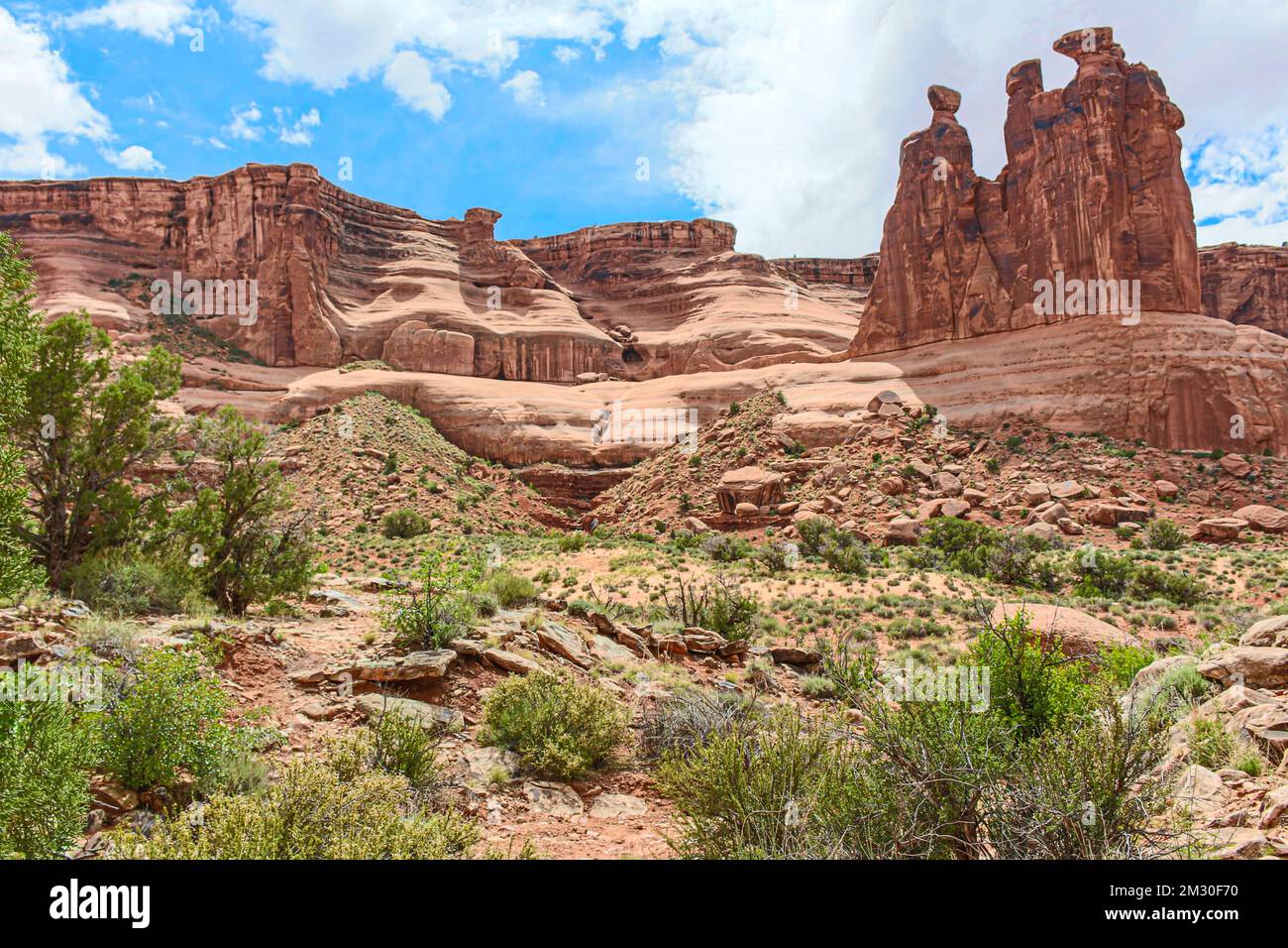 The Three Gossips rock structures on the Park Avenue Trail in Courthouse Towers area of Arches National Park, Moab, Utah, USA Stock Photo