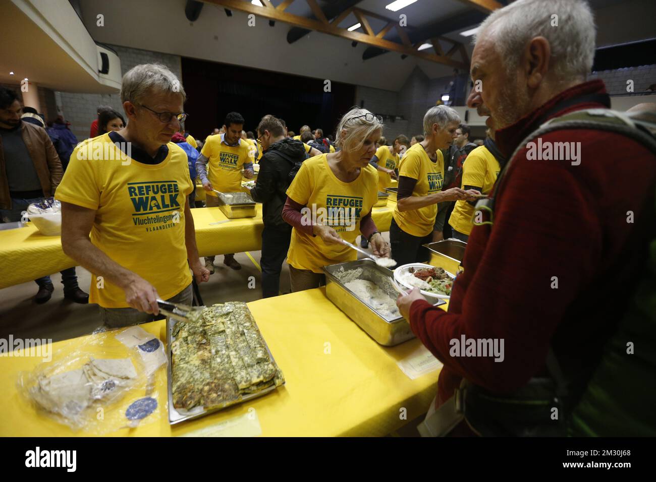 Illustration picture shows participants having breakfast during the fourth edition of the 'Refugee Walk', a 40km walk organised by Vluchtelingenwerk Vlaanderen to raise money for people fleeing war and persecution, Sunday 29 September 2019, in Mechelen. BELGA PHOTO NICOLAS MAETERLINCK  Stock Photo