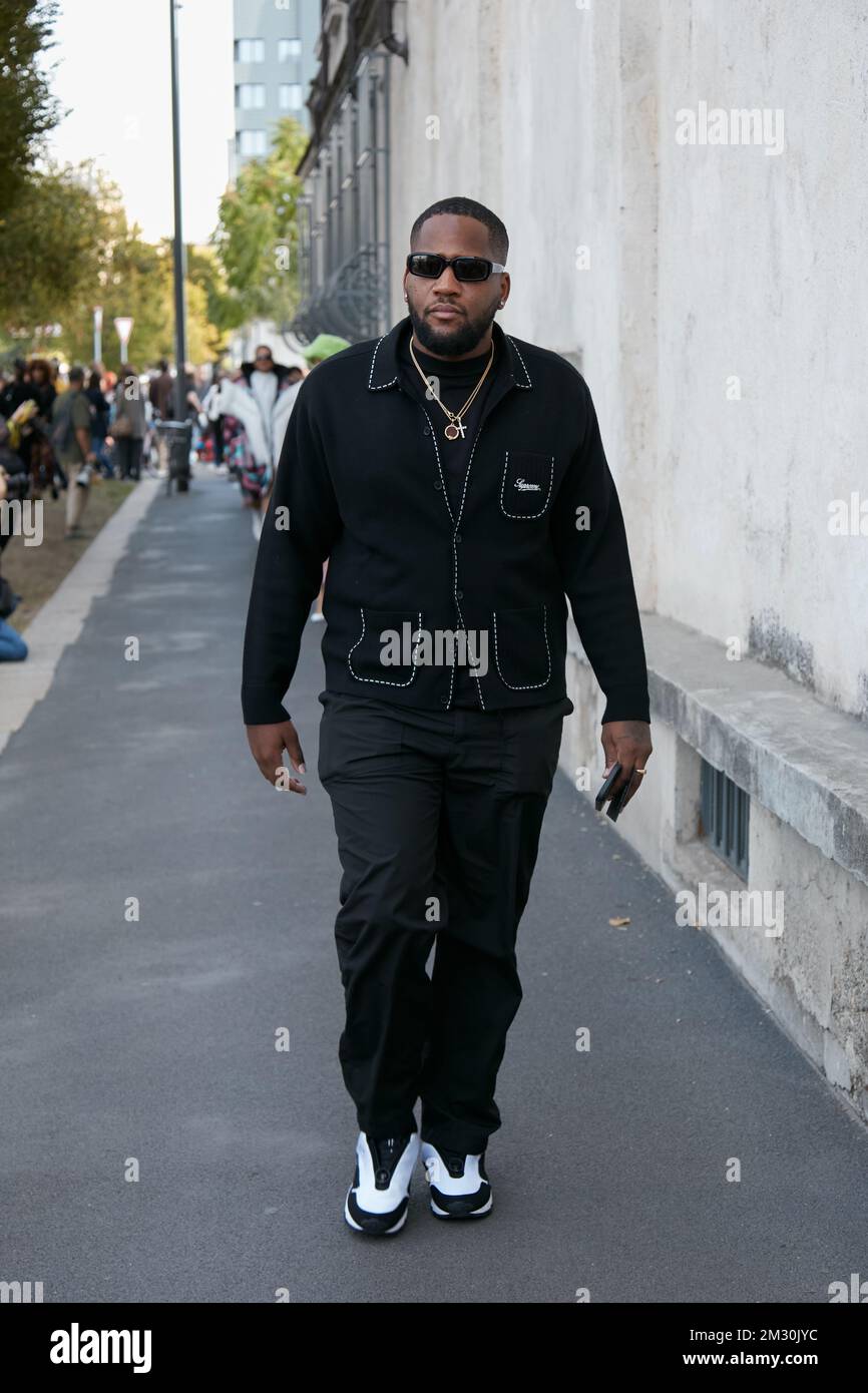 MILAN, ITALY - SEPTEMBER 19, 2019: Man with red denim Louis Vuitton Supreme  jacket before Fendi fashion show, Milan Fashion Week street style Stock  Photo - Alamy