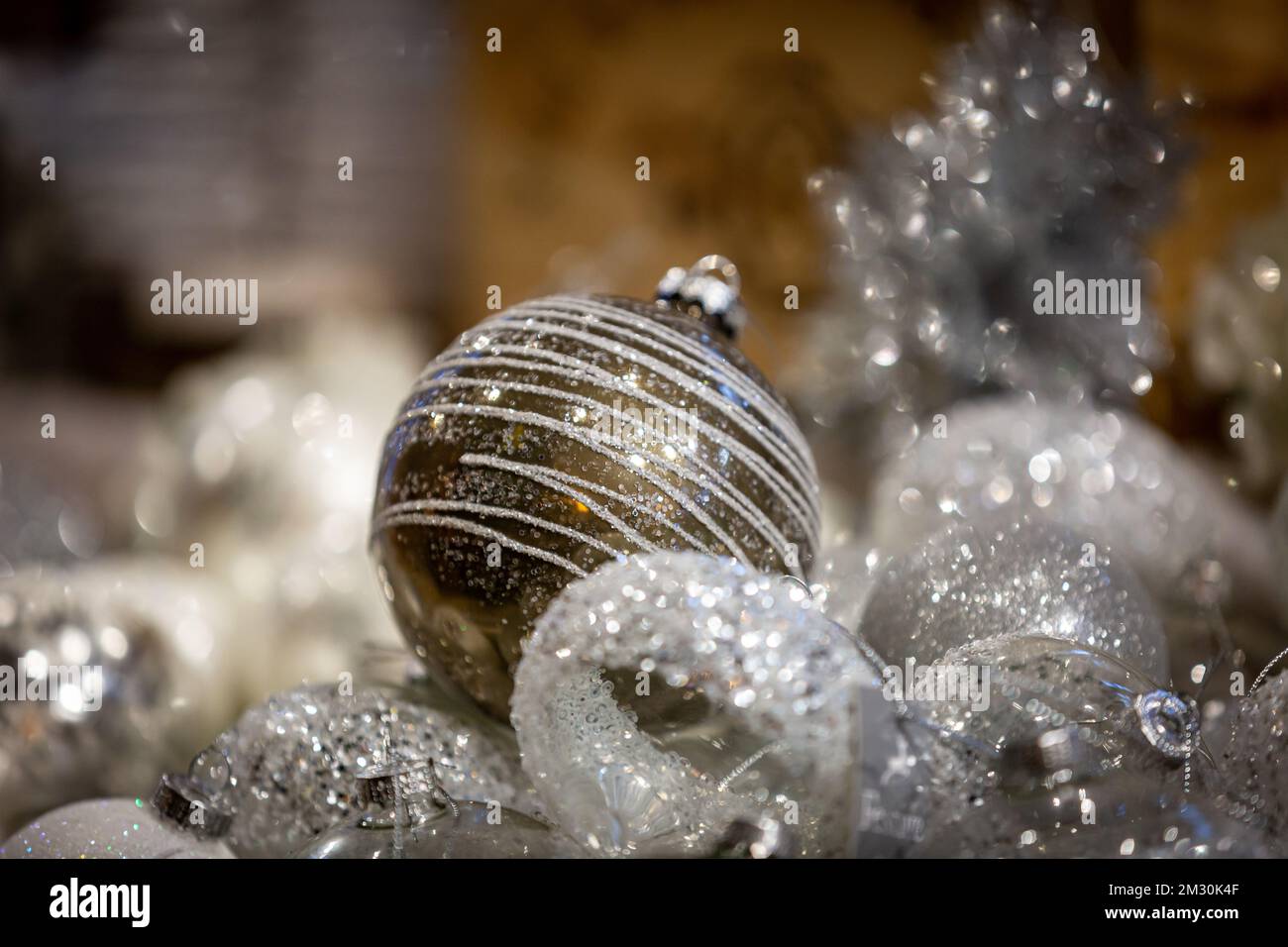 A close up of decorative Christmas baubles, with a shallow depth of ...