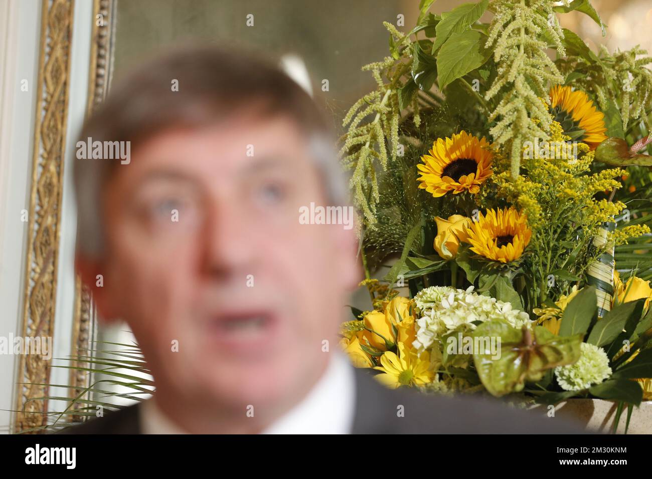 Sunflowers pictured behind N-VA's Jan Jambon during a press conference regarding the formation of a new Flemish regional government, Monday 30 September 2019, in Brussels. BELGA PHOTO NICOLAS MAETERLINCK  Stock Photo