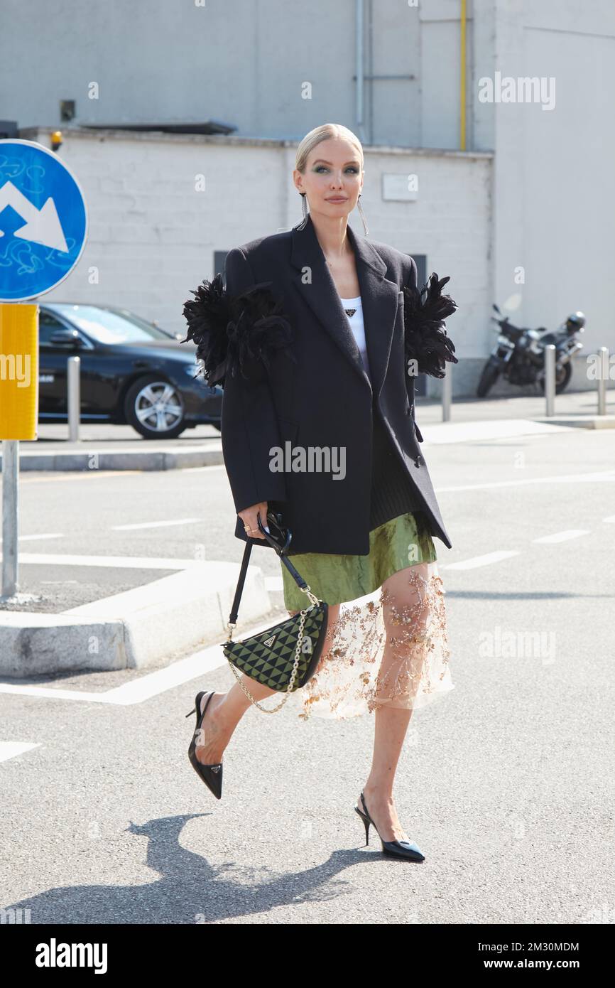 MILAN, ITALY - SEPTEMBER 22, 2022: Leonie Hanne before Prada fashion show, Milan Fashion Week street style Stock Photo