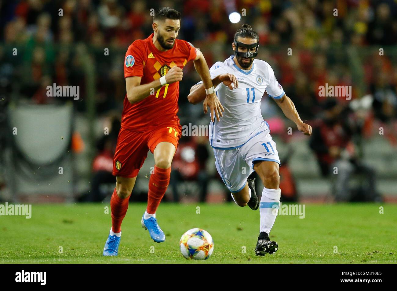 Belgium's Yannick Carrasco and San Marino's Manuel Battistini fight for the ball during a soccer game between Belgian national team the Red Devils and San Marino, Thursday 10 October 2019 in Brussels, match 7/10 in the qualifications for the UEFA Euro 2020 tournament. BELGA PHOTO BRUNO FAHY Stock Photo