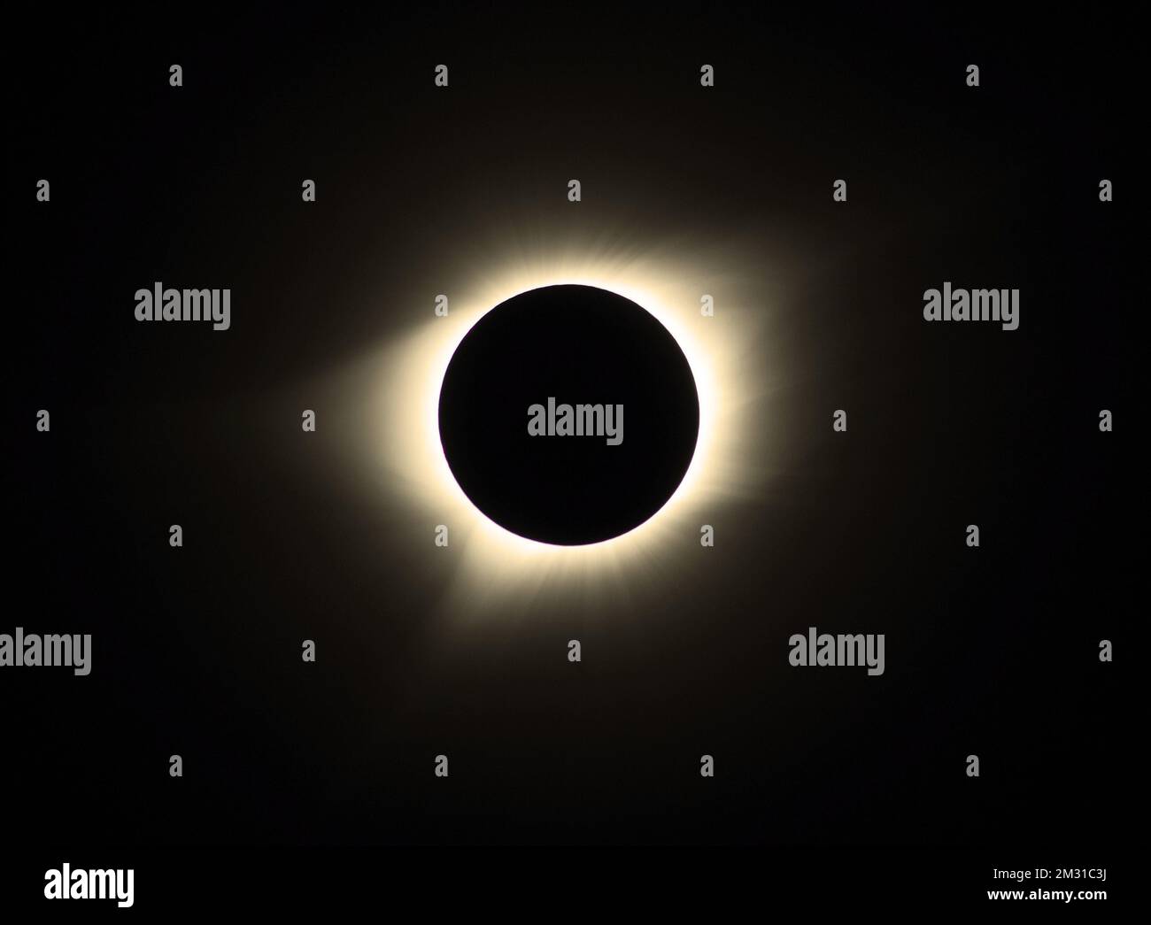 Solar eclipse of 21 August 2017. The corona, a region of the Sun only seen from Earth when the Moon blocks out the Sun's bright face during total solar eclipses. The corona holds the answers to many of scientists' outstanding questions about the Sun's activity and processes. This photo was taken during the total solar eclipse on Aug. 21, 2017 from Oregon, USA  Credit: NASA/Golpalswamy Stock Photo