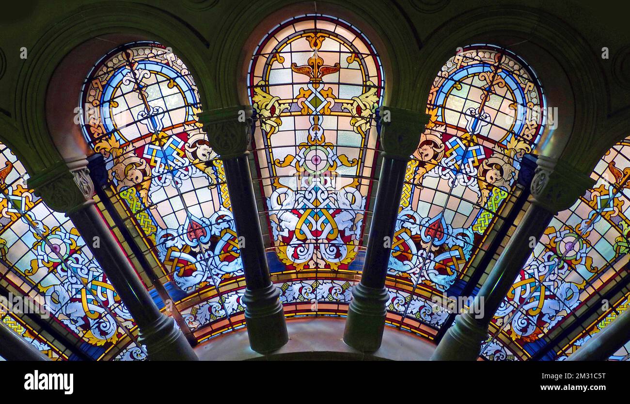 Stained glass windows in the Queen Victoria Building, Town Hall, Sydney, Australia, was designed by architect George McRae in the Romanesque style. Construction began in 1893 & the building was completed in 1898. The building was originally known as the George Street Market, but was renamed the Queen Victoria Building in 1918 in honour of the long reigning queen. Stock Photo