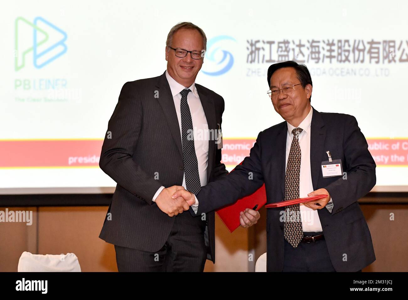 Wim POOT, Executive Vice President, PB LEINER and Ma Yong JUN, Chairman of Board of Directors, ZHEJIANG SHENGDA OCEAN pictured during a signing ceremony, on the third day of a Belgian economic trade mission to China, Wednesday 20 November 2019. Several federal and regional ministers accompany the princess on an economic mission to China from 18 to 23 November. BELGA PHOTO DIRK WAEM Stock Photo