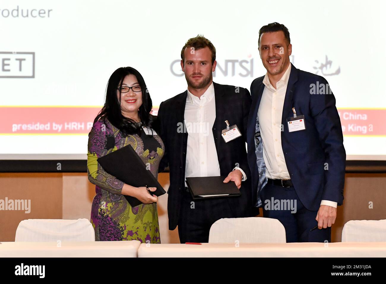 Ruben Goots, Founding Partner Hamlet, Jason Felstead Founding Partner Hamlet and Jacqueline Xueqin Zhang, Managing Director Gwantsi pictured during a signing ceremony, on the third day of a Belgian economic trade mission to China, Wednesday 20 November 2019. Several federal and regional ministers accompany the princess on an economic mission to China from 18 to 23 November. BELGA PHOTO DIRK WAEM Stock Photo