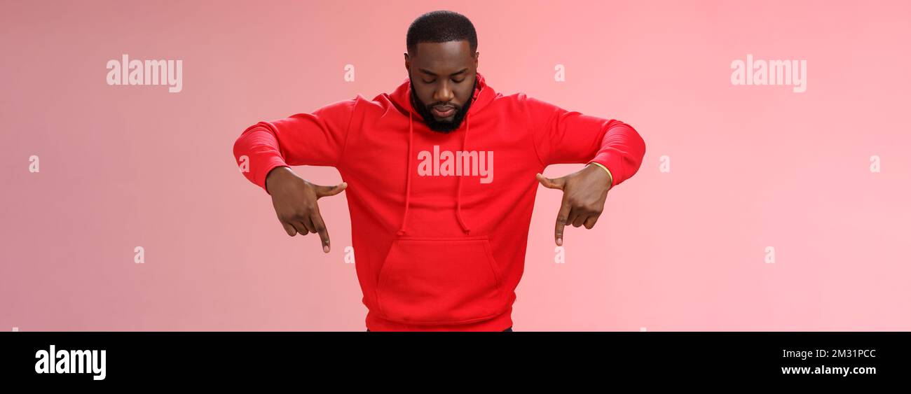 Guy wearing hoodie looking down hires stock photography and images Alamy