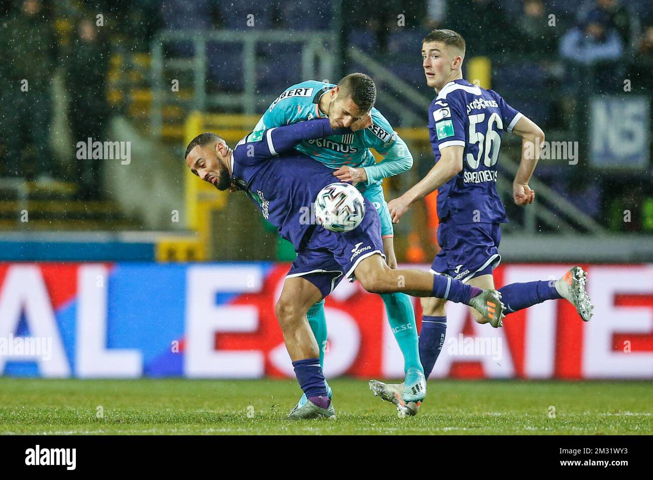 BRUSSELS, BELGIUM - December 08: Jeremy Doku of Anderlecht and Maxime Busi  of Charleroi fight for the ball during the Jupiler Pro League match day 18  between Rsc Anderlecht vs Sporting Charleroi